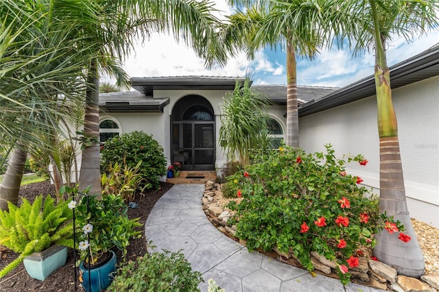 entrance to property featuring a garage