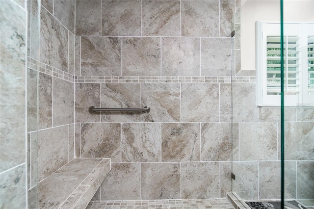 room details featuring tiled shower