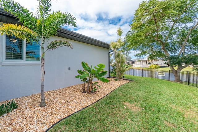 view of yard featuring a water view