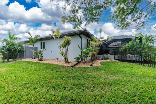 view of yard with a lanai