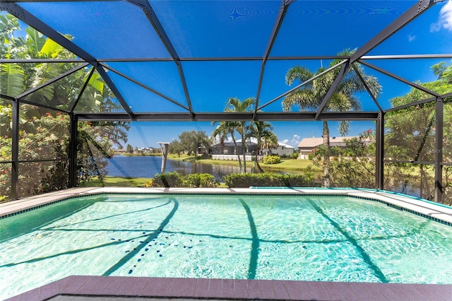 view of swimming pool featuring a water view and a lanai