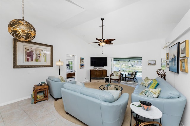 living room with ceiling fan, light tile patterned floors, and high vaulted ceiling