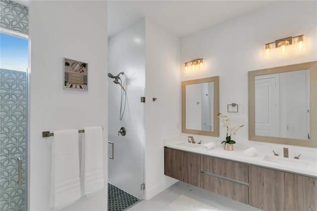 bathroom featuring vanity and walk in shower