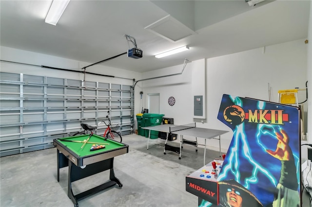 playroom featuring billiards, concrete flooring, and electric panel