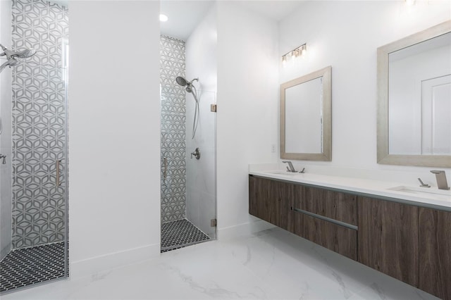 bathroom featuring vanity and a tile shower