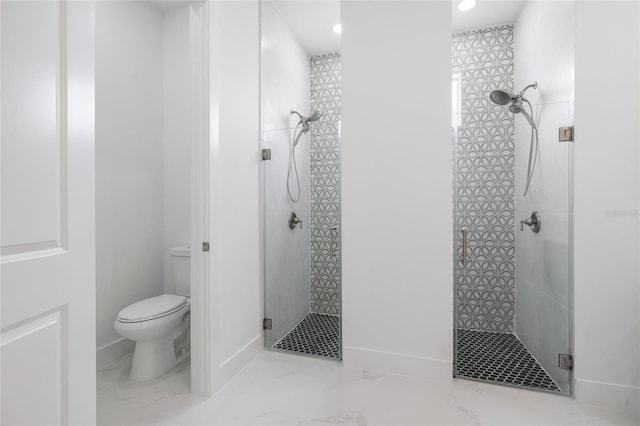 bathroom featuring an enclosed shower and toilet