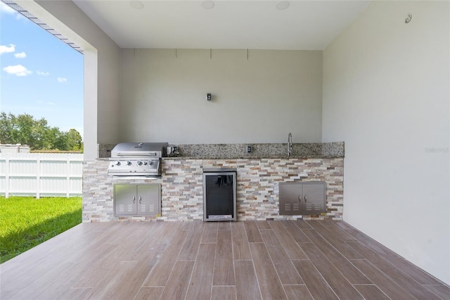 view of patio with area for grilling and grilling area