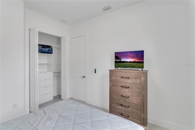 unfurnished bedroom with a closet