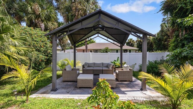 view of patio featuring outdoor lounge area and a gazebo