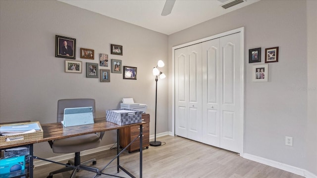 office with ceiling fan and light wood-type flooring