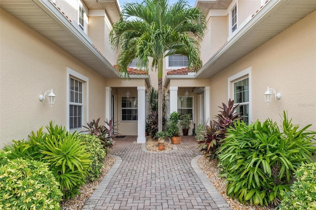 doorway to property featuring a patio