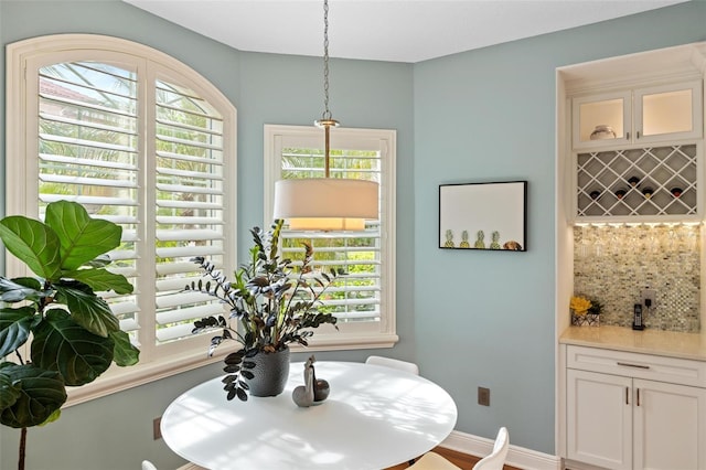 dining area featuring hardwood / wood-style floors