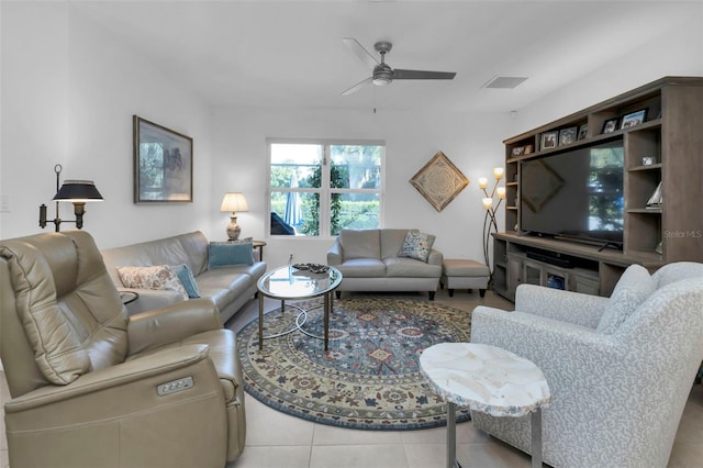 living room featuring ceiling fan and light tile patterned flooring