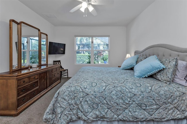 carpeted bedroom featuring ceiling fan