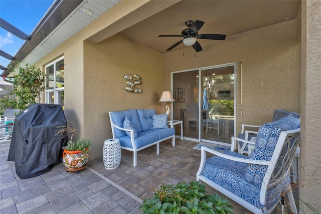 view of patio / terrace with grilling area and ceiling fan