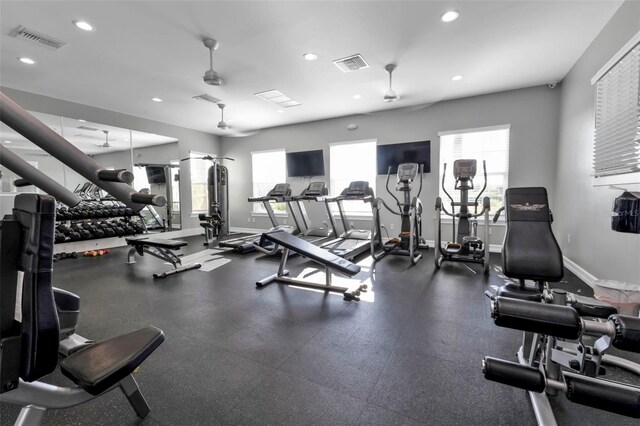 exercise room with ceiling fan