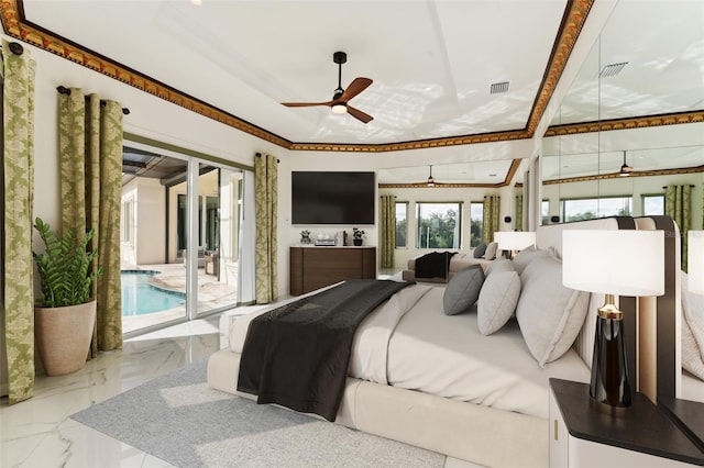 bedroom with ornamental molding, ceiling fan, a raised ceiling, and access to exterior