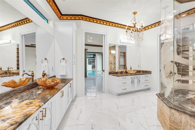 bathroom featuring vanity, crown molding, and a shower with door