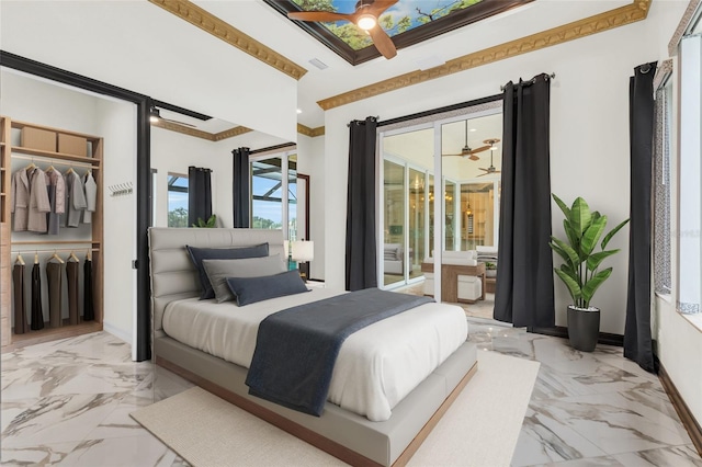 bedroom with ornamental molding, a closet, and ceiling fan