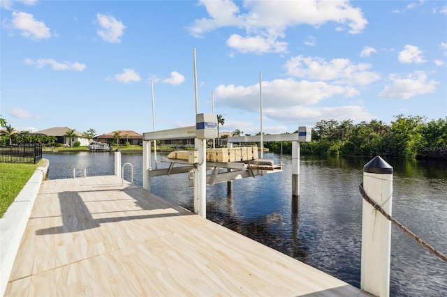 dock area featuring a water view