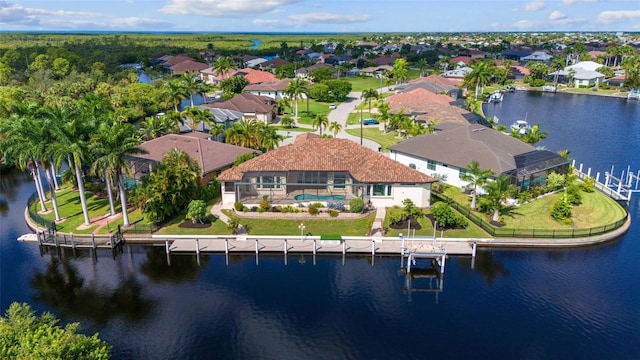 drone / aerial view featuring a water view