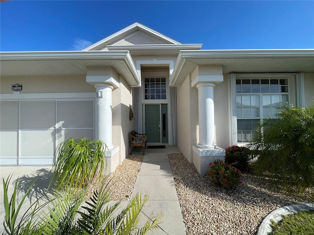 property entrance with a garage