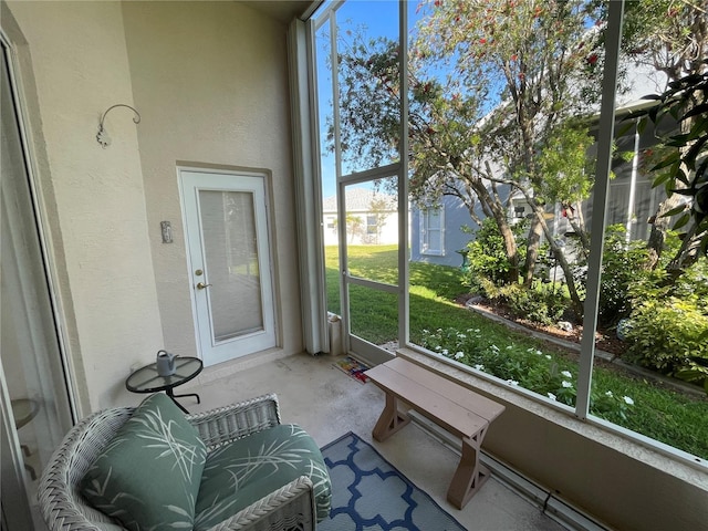 sunroom featuring plenty of natural light