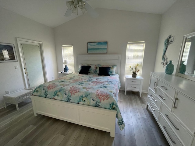 bedroom featuring lofted ceiling, ceiling fan, and dark wood-type flooring