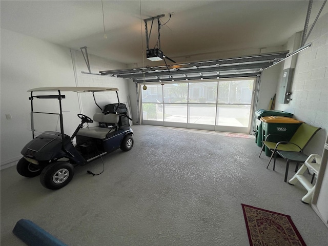 garage featuring a garage door opener