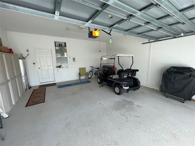 garage featuring a garage door opener