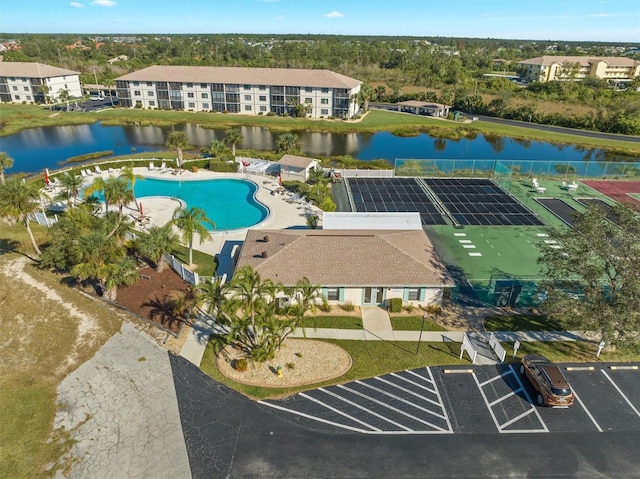 drone / aerial view with a water view