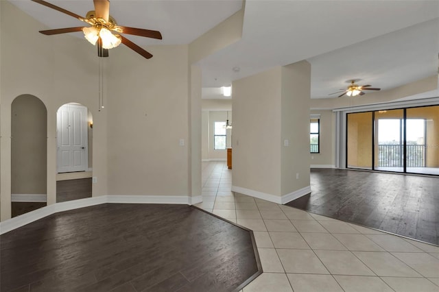 unfurnished room featuring ceiling fan and light hardwood / wood-style flooring