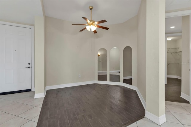 interior space with ceiling fan and light wood-type flooring