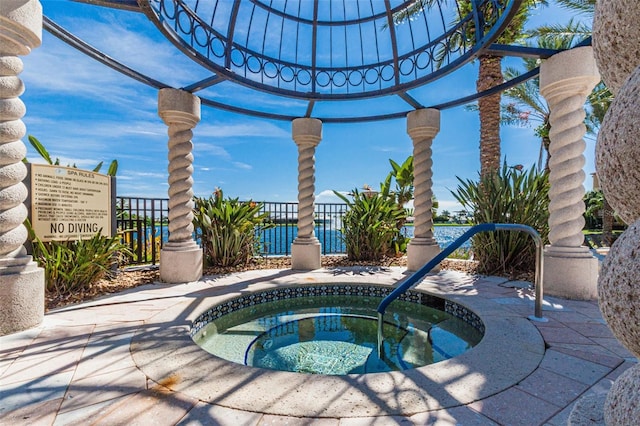 view of pool featuring a community hot tub