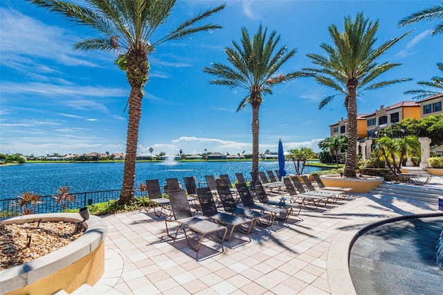 view of patio with a water view