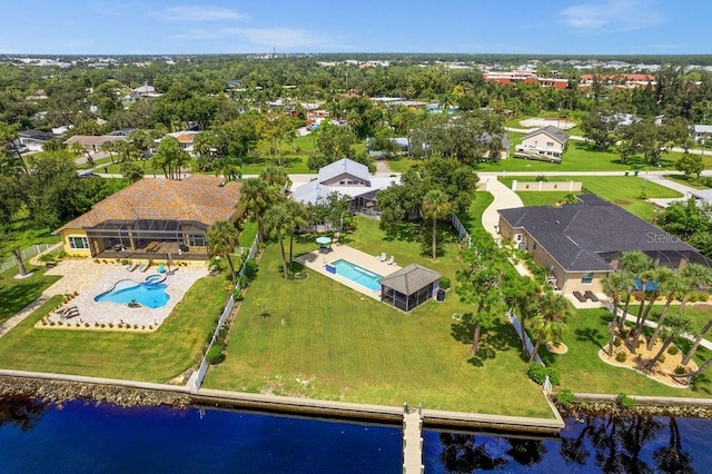 drone / aerial view with a water view