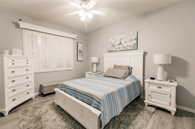 bedroom featuring ceiling fan and light wood-type flooring