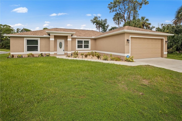 view of front facade featuring a front lawn and a garage