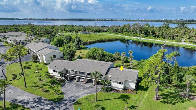 drone / aerial view with a water view