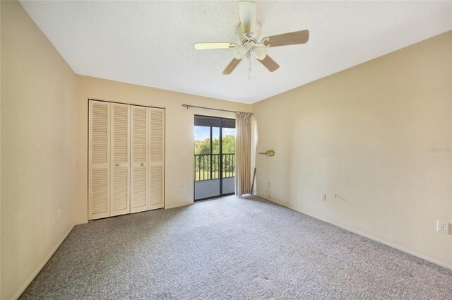 unfurnished bedroom with a closet, carpet, ceiling fan, and access to outside