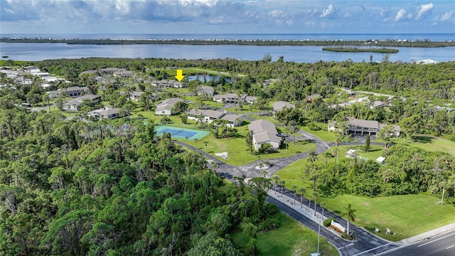 drone / aerial view with a water view