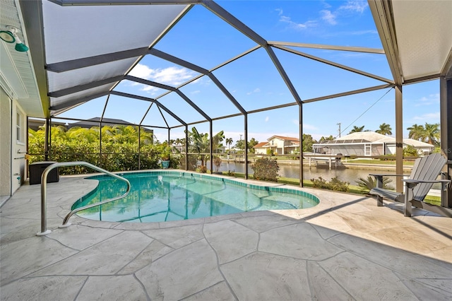 view of pool featuring a water view, a patio area, and a lanai