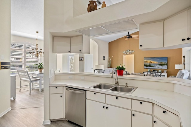 kitchen with dishwasher, sink, white cabinets, ceiling fan with notable chandelier, and light wood-type flooring