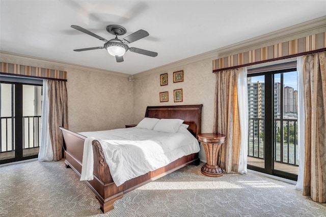 carpeted bedroom with crown molding, ceiling fan, and access to exterior