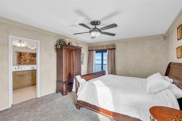 bedroom with ceiling fan, carpet floors, crown molding, and ensuite bathroom