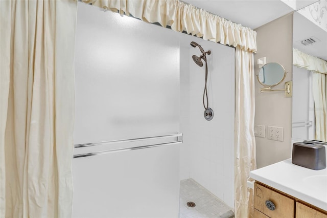 bathroom with vanity and a shower with curtain