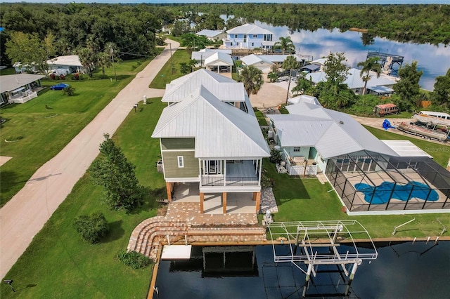 birds eye view of property featuring a water view