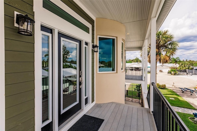 entrance to property with stucco siding