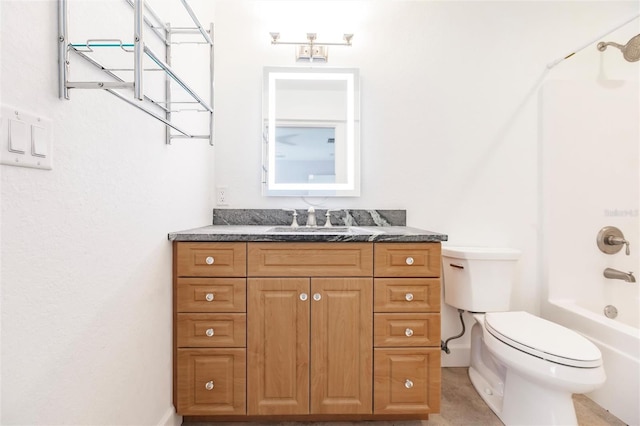 full bathroom with toilet, vanity, and shower / tub combination