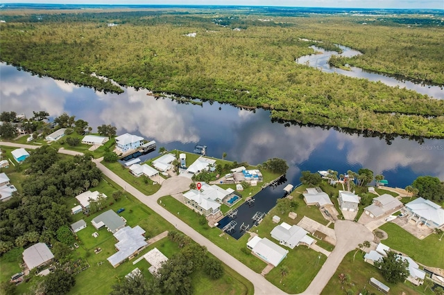 birds eye view of property featuring a residential view and a water view